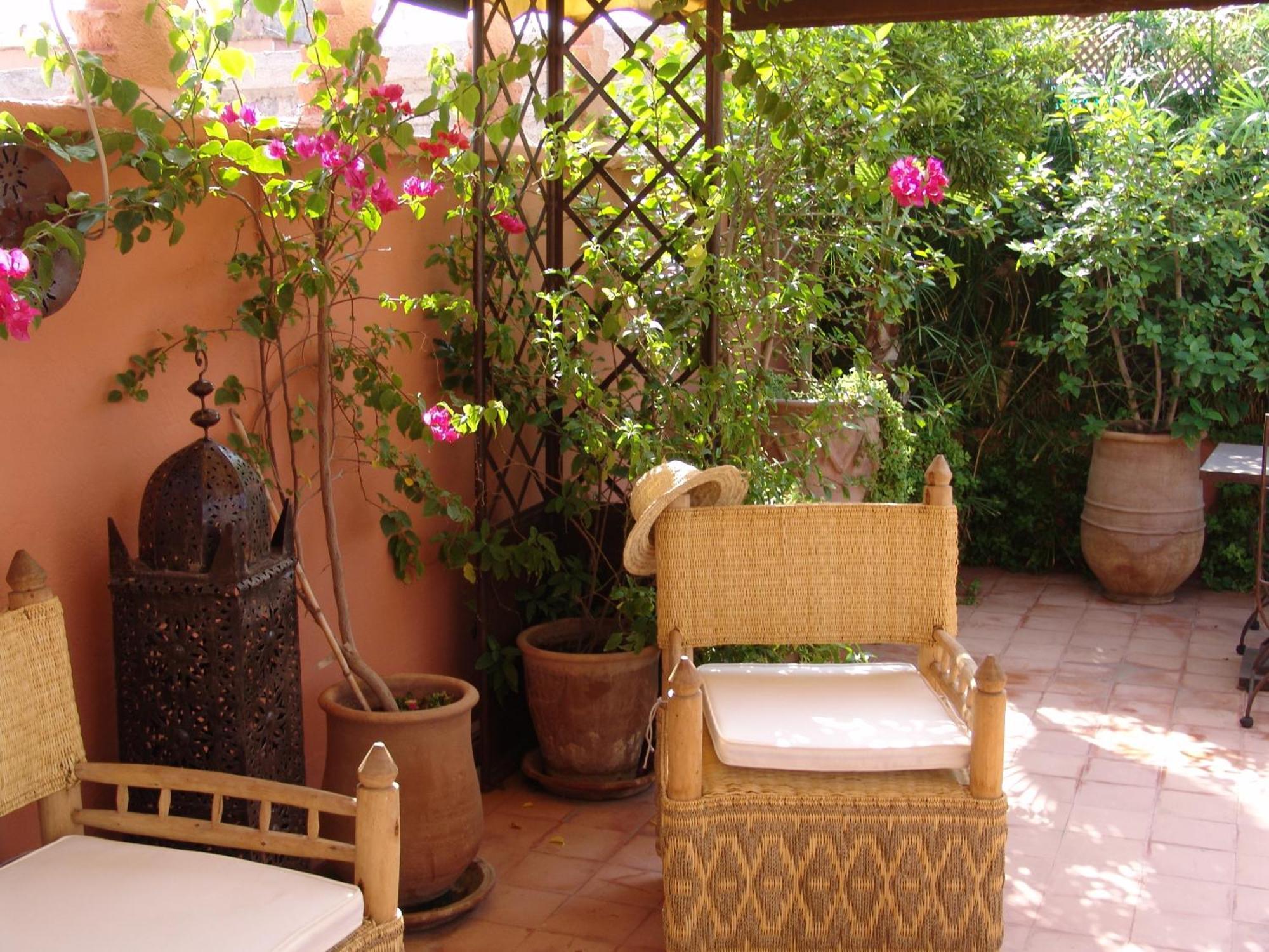 Riad Les Nuits De Marrakech Marrakesch Exterior foto A terrace in Marrakech