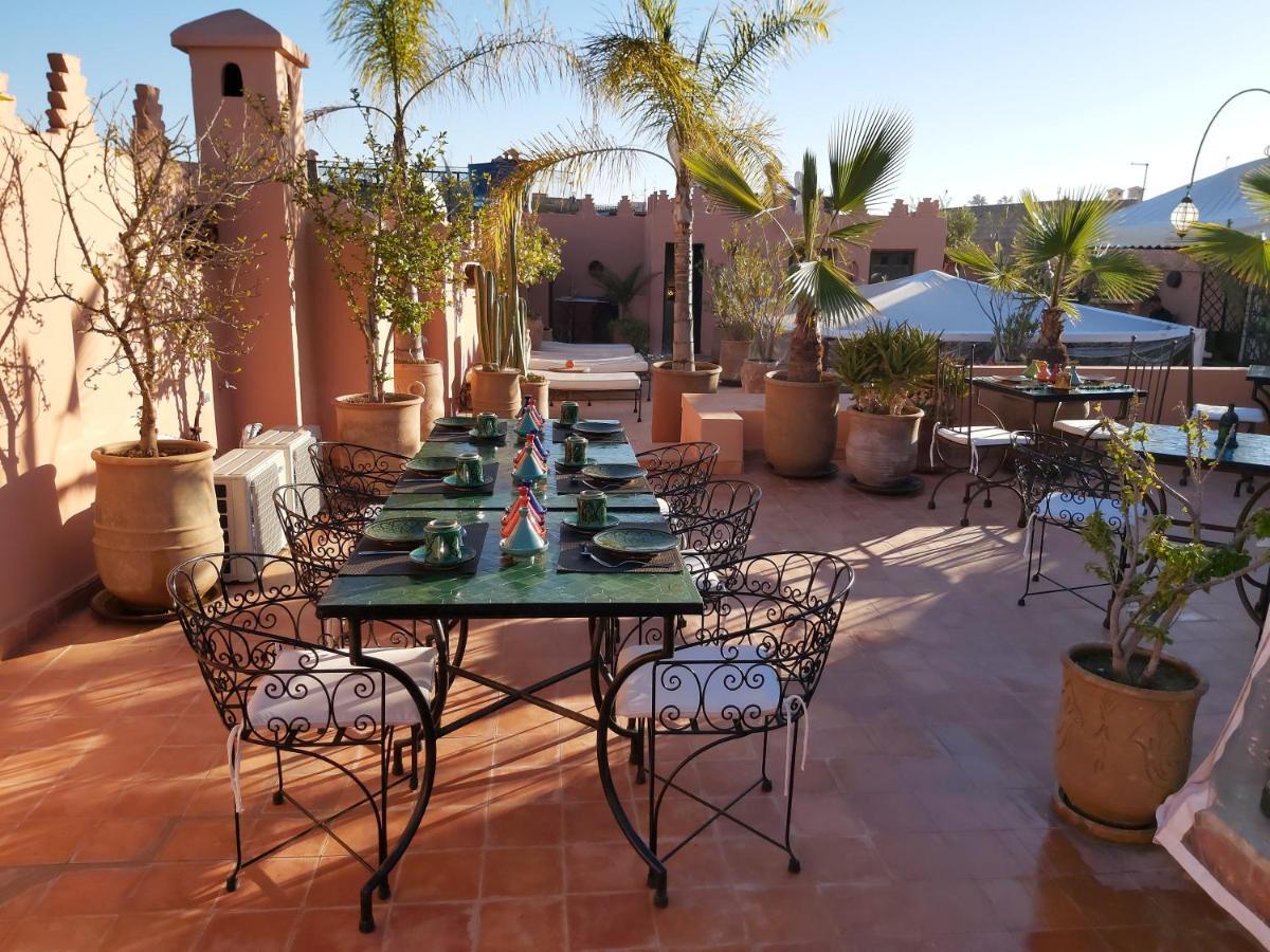 Riad Les Nuits De Marrakech Marrakesch Exterior foto Roof terrace of a riad in Marrakech